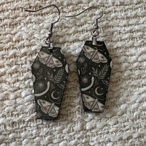 Moth and snake earrings